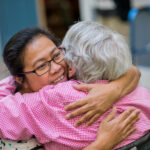Patient Gives Hug to His Relative