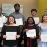 Students With Their Award Scholarships