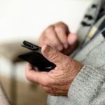 Senior Man Holding a Mobile