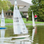 4 Small Boats in River